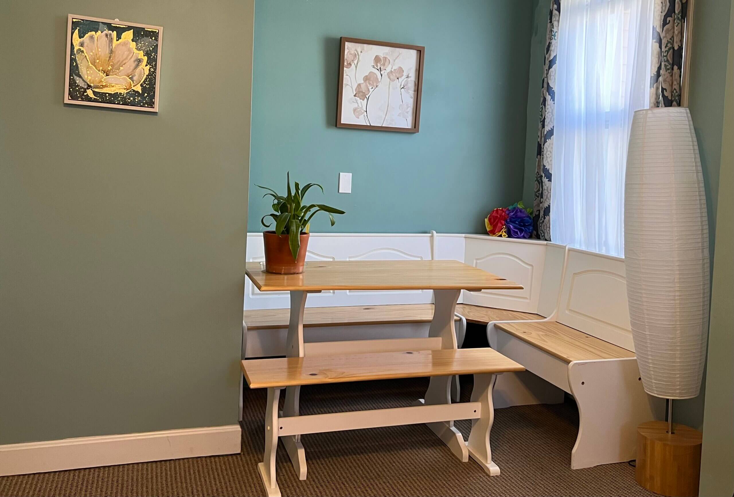 suite 102 desk and art area